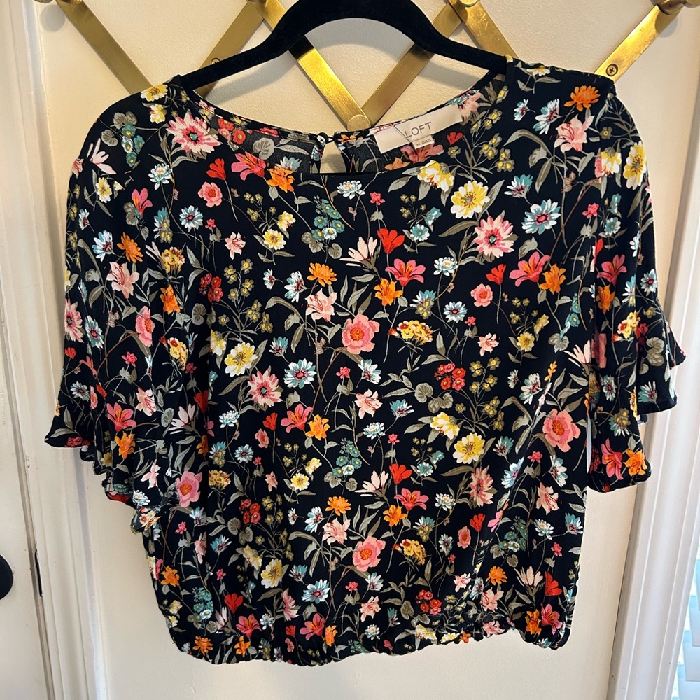 Black multi-colored floral top with synched waist